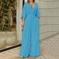Elegant V-ringad jumpsuit med vida ben